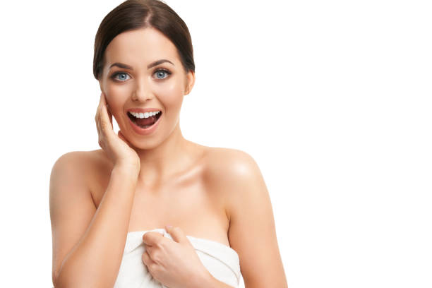 istock Beautiful woman face close up studio on white 1145880651