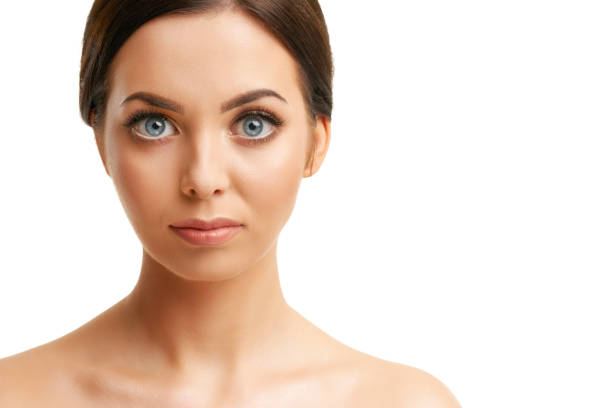 istock Beautiful woman face close up studio on white 1145880682