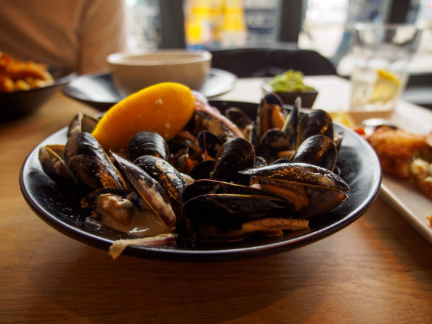 Cornish cream mussels at restaurant, St. Ives, England stock photo