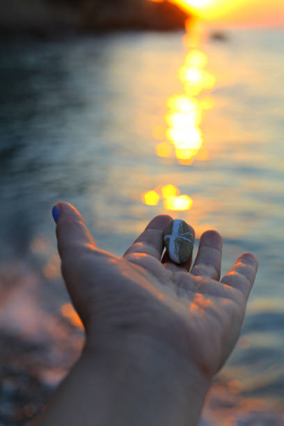 istock Crisscross stone, sea and sun 1145883775