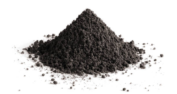 Pile of black soil Pile of black soil, isolated on white background ash stock pictures, royalty-free photos & images