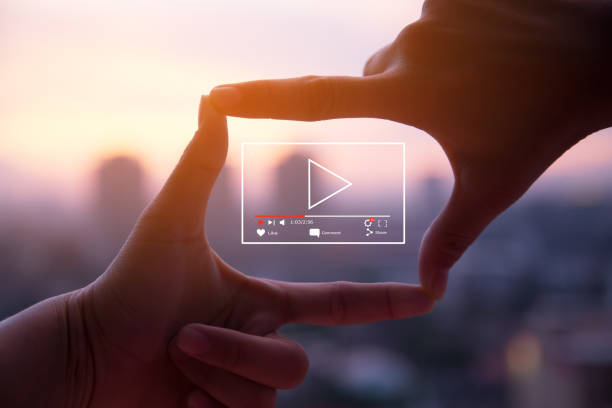 Online live video marketing concept Photo sign made by human hands on blurred sunset sky as background pushing photos stock pictures, royalty-free photos & images