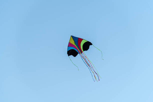 istock Colorful Kite Flying under blue sky 1145890360