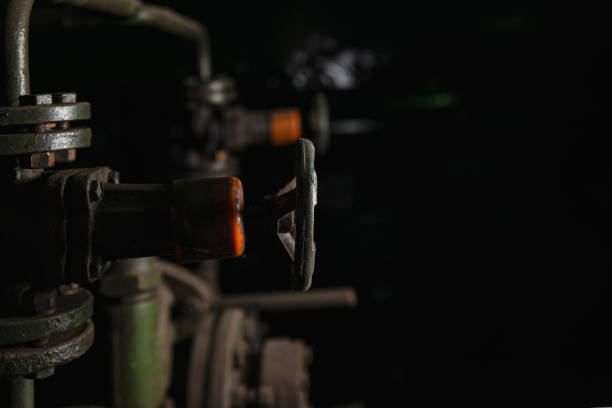 Metal valve industrial valves installed on the design, background
