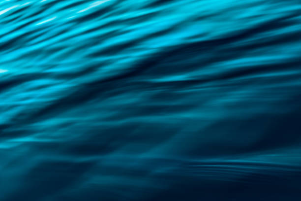 istock Abstract Background. Dark Blue. Water Surface. Play of Ripples. 1145898846