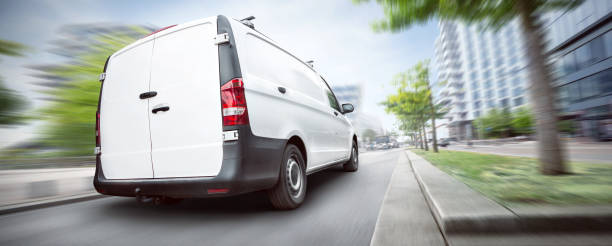 istock Dynamic commercial van driving through the city 1145899969