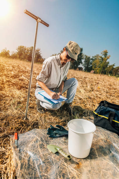 istock Soil Testing. Female Agronomists Taking Notes Outdoor 1145902351