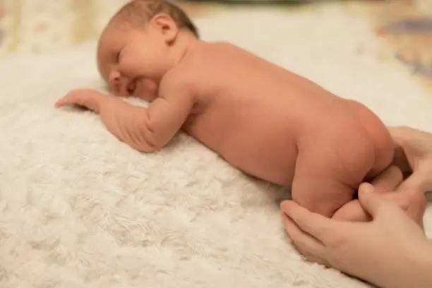 Photo of Newborn baby with mother's hands