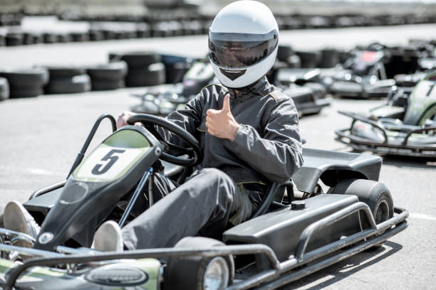 istock Man in the kart on the track 1145903428