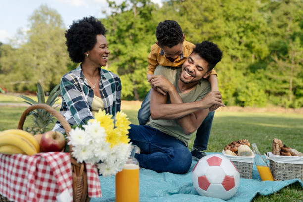 istock Happy family spending a spring day on picnic 1145903570