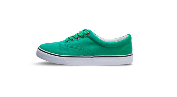 istock Green canvas shoes isolated on white background 1145904392