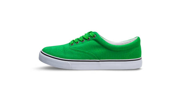 istock Green canvas shoes isolated on white background 1145904434