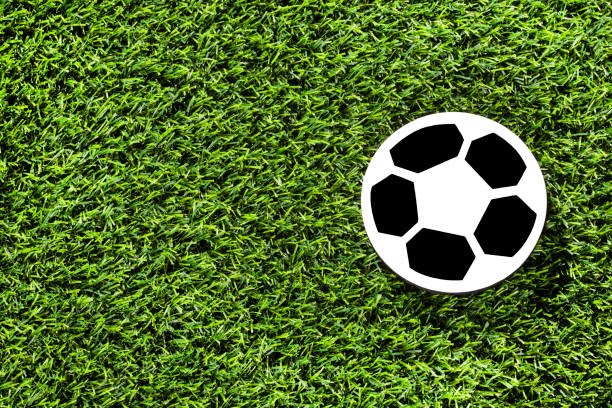 istock Soccer ball on the synthetic grass 1145904516