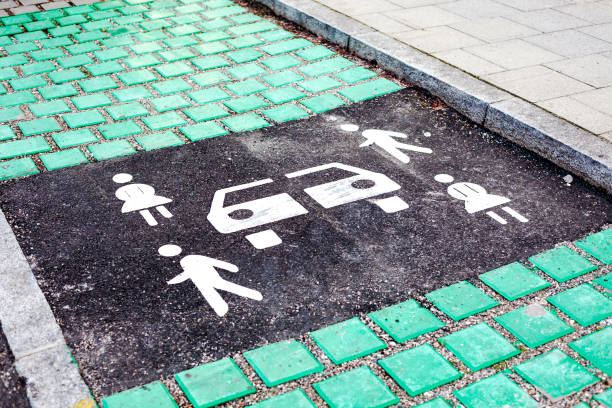 istock Car sharing vehicle parking sign on asphalt road 1145904646