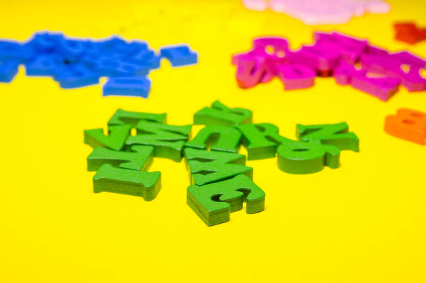 istock wooden letters separated by colors 1145904687