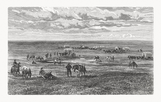 North American prairie with settler camp. Wood engraving after a photograph, published in 1897.