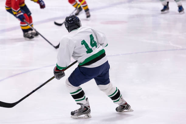 istock Mature woman playing hockey 1145906037