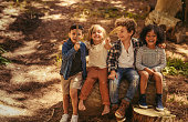 istock Cute kids outdoor enjoying nature 1145906872