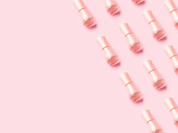 istock Nude nail polish pattern on pink monochrome 1145908323