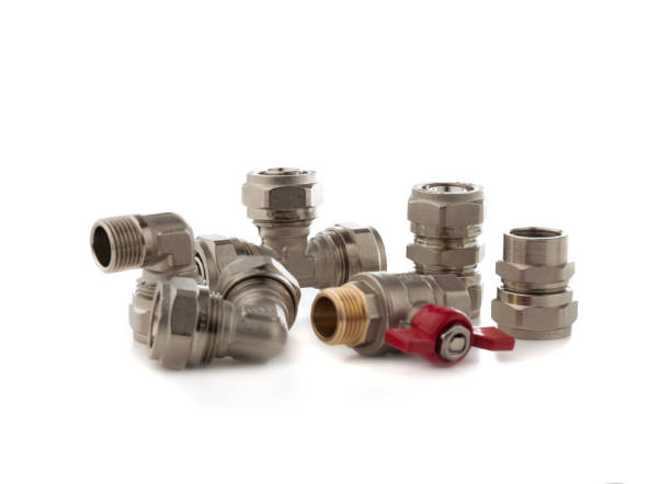 istock Fittings for water on a white background. Brass fittings close-up. 1145910310