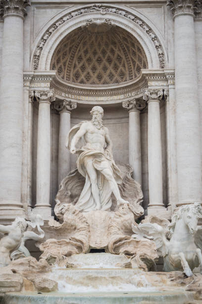 Neptune in the beautiful Trevi Fountain in Rome stock photo