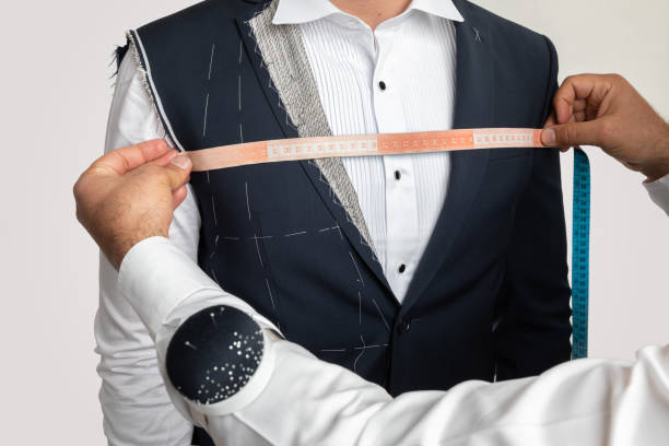 istock Man Measuring Jacket on Male Dress 1145912082
