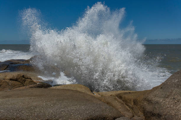 Waves crashing against the stony ocean shore, Uruguay