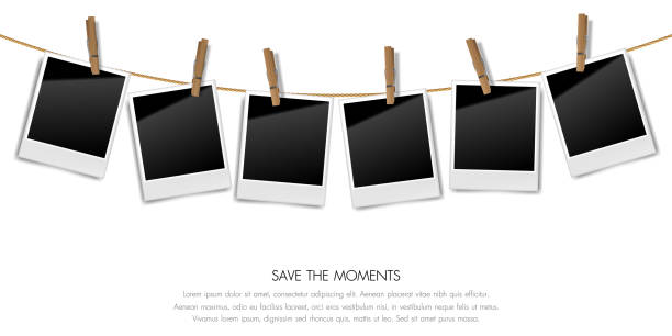 Realistic blank retro photo frames on a rope with wooden clips, Vector illustration Realistic blank retro photo frames on a rope with wooden clips, Vector illustration rope photos stock illustrations