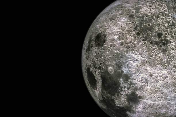 istock Moon surface and texture with craters isolated on black background with copy space 1145915188