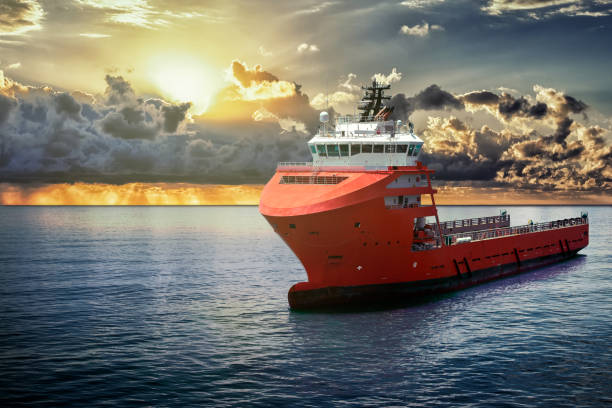 istock Offshore supply boat at sea during nice calm weather performing duties. Compositing technique. 1145915994