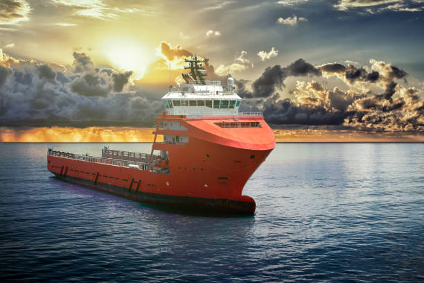istock Offshore supply boat at sea during nice calm weather performing duties. Compositing technique. 1145915998