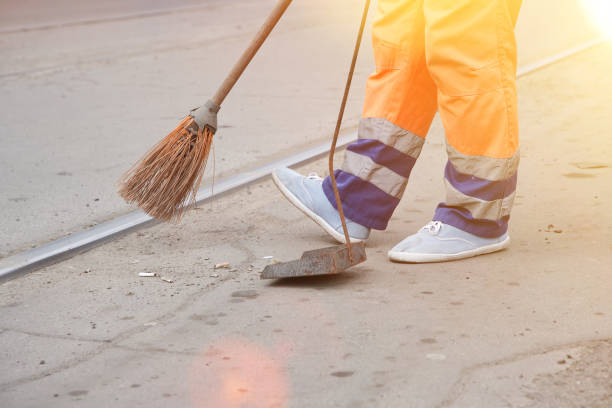 istock Cleaner scavenges cigarette butts in the streets 1145917663