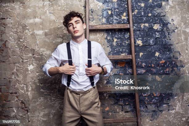 Young Fashionable Office Worker Wearing Pants with Hanging Suspenders.  Stock Photo - Image of fashionable, back: 113655762