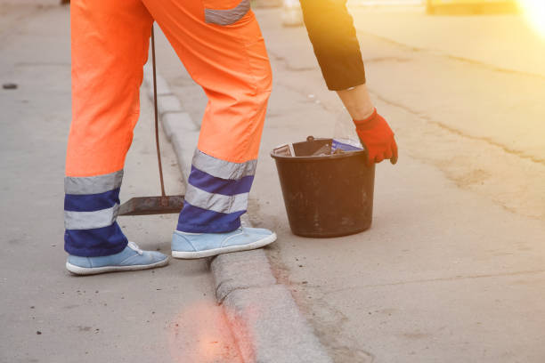 istock Cleaner scavenges cigarette butts in the streets 1145917829