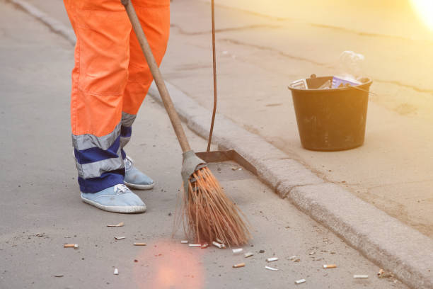 istock Cleaner scavenges cigarette butts in the streets 1145917865
