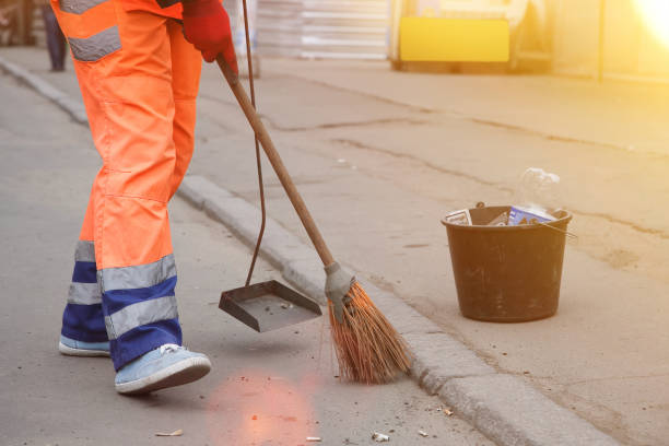istock Cleaner scavenges cigarette butts in the streets 1145917890