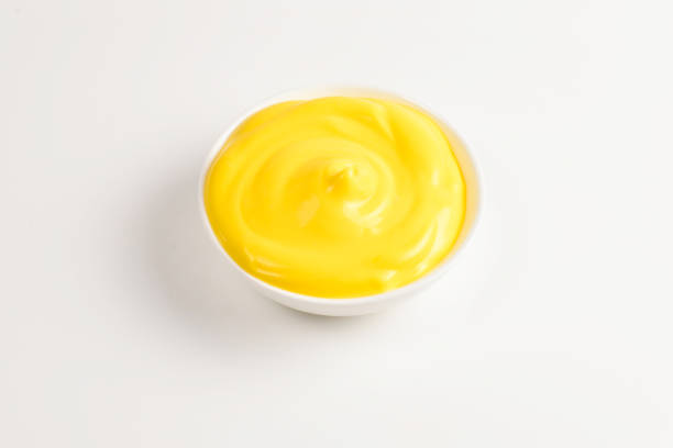 istock Cheese sauce in white plate on white background. 1145919923