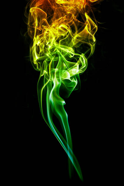 istock Colorful smoke on dark background 1145921336