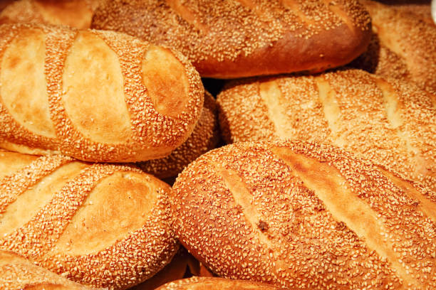 istock Fresh baked white bread close-up with a group of seeds 1145921544