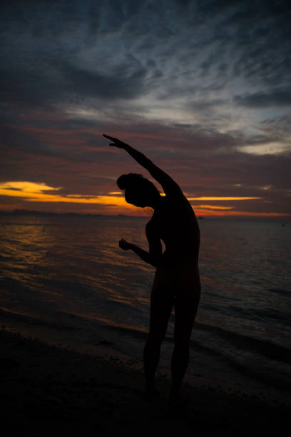 istock Stretching the human body at sunset 1145930914