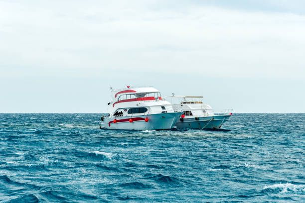 istock several white yachts are in the blue sea 1145932743
