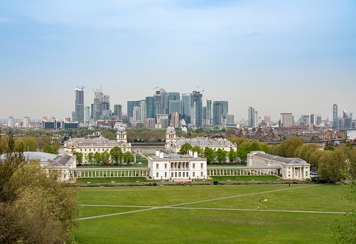 LONDON, UK - 23 APRIL 2019: Queen's House in Greenwich with Canary Wharf financial district in background