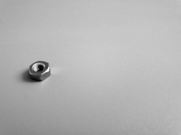 istock Metal nut closeup. The nut from metal isolated. 1145935996