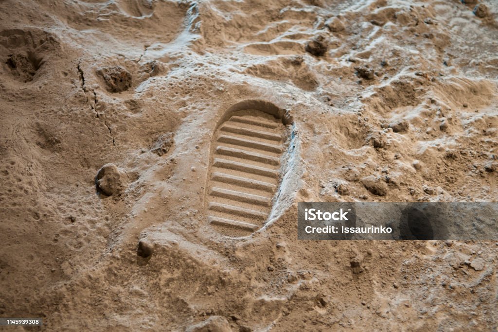 Footprint on the Moon Footprint on the Moon surface Moon Surface Stock Photo