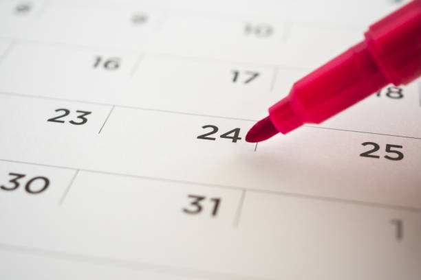 istock calendar page with red pen close up 1145943782