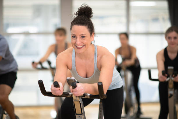 istock Afternoon stationary cycling class 1145944461