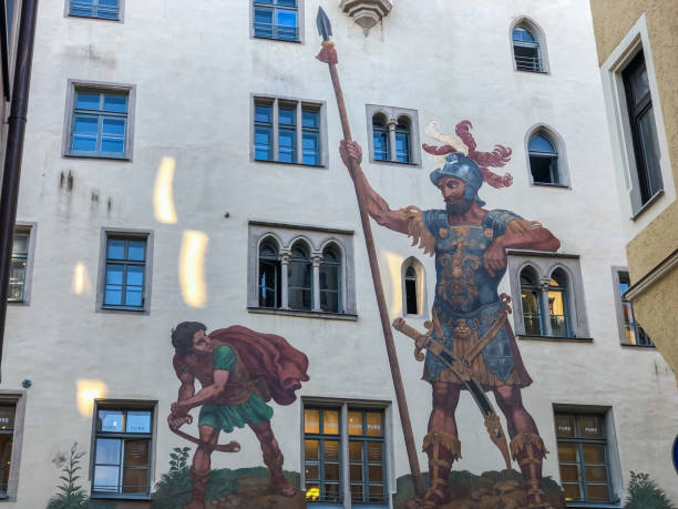 Regensburg/Germany - October 12, 2018: Painting of the fight between David and Goliath. This is one of the landmarks of the UNESCO World Heritage City of Regensburg.