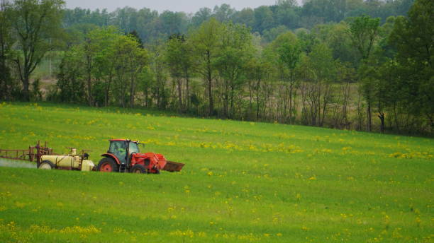 istock Farmer spraying field in Missouri 1145948647