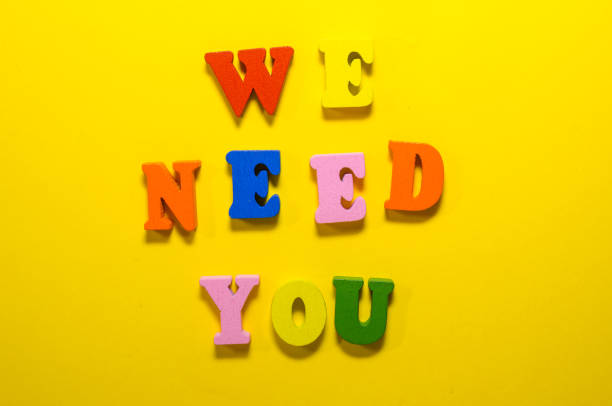 istock we need you with wooden letters 1145951742