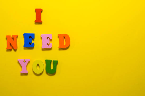 istock i need you with wooden letters 1145951847
